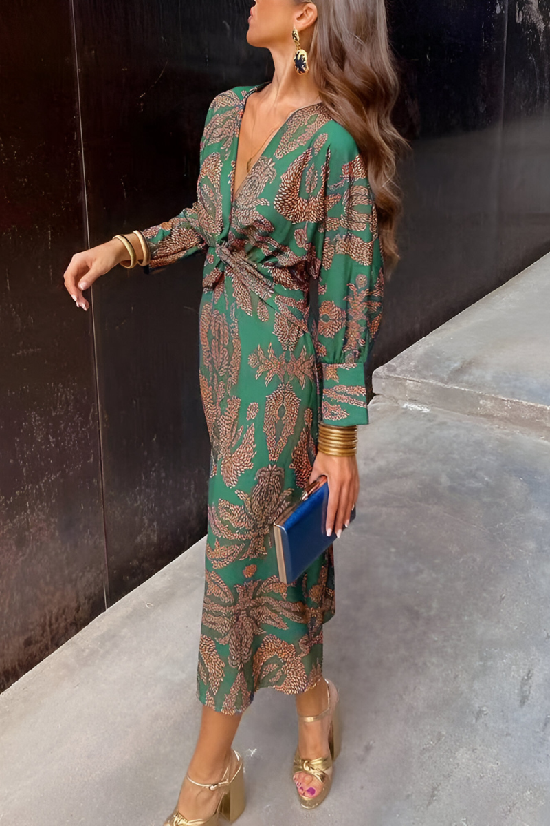 Elegante midi-jurk met twist-detail en bloemenpatroon – Tijdloos en stijlvol